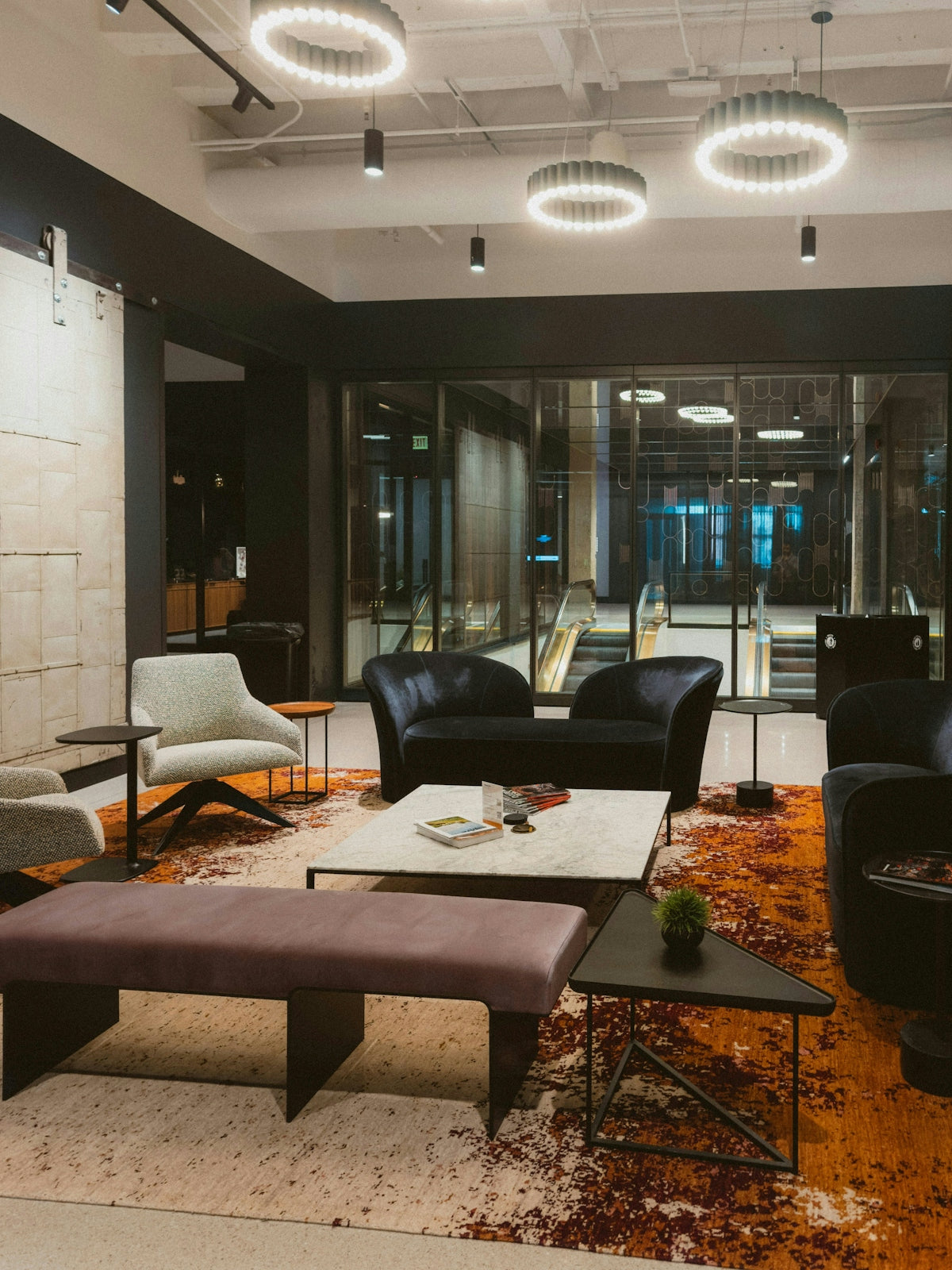 Modern lounge area with comfortable seating and unique lighting