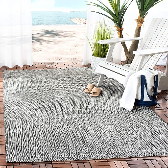 SAFAVIEH Outdoor Area Rug 5'3"x7'7" by Unknown
