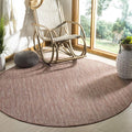 SAFAVIEH Outdoor Round Rug 6'7" by Unknown