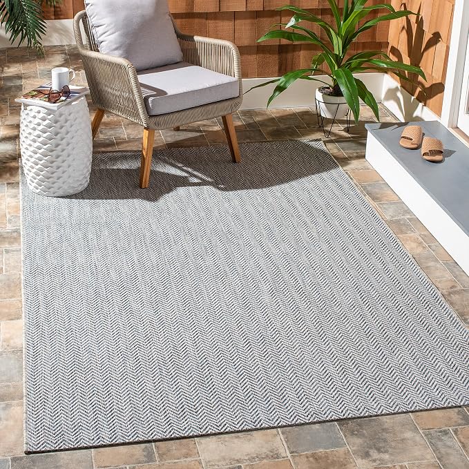 SAFAVIEH Outdoor Accent Rug 4'x5'7" by Unknown